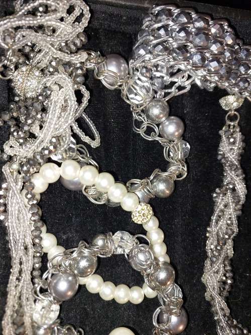 A  BEAUTIFUL COLLECTION OF FASHION BANGLES AND BRACELETS SOLD AS IS