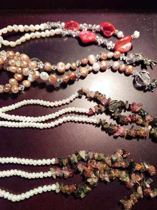 A COLLECTION OF PEARL NECKLACES IN PERFECT CONDITION SOLD AS IS