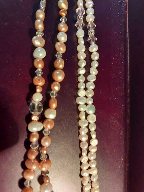 A COLLECTION OF PEARL NECKLACES IN PERFECT CONDITION SOLD AS IS