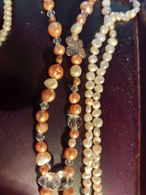 A COLLECTION OF PEARL NECKLACES IN PERFECT CONDITION SOLD AS IS