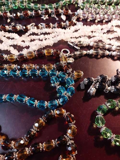 A JOB LOT COSTUME NECKLACES IN PERFECT CONDITION SOLD AS IS