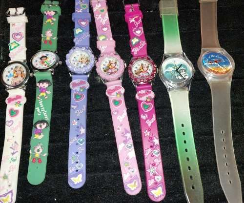 A COLLECTION OF BARBIE DOLL WATCHES