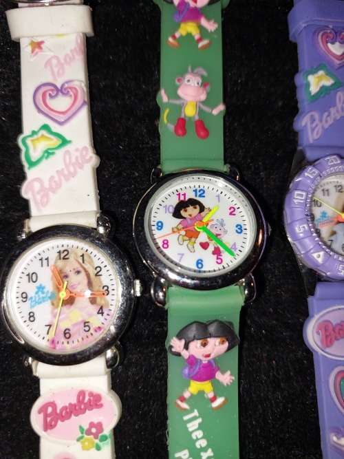 A COLLECTION OF BARBIE DOLL WATCHES