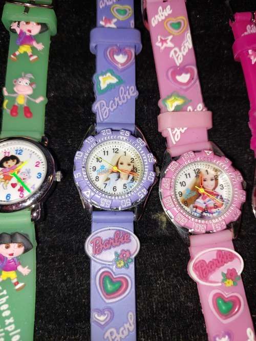 A COLLECTION OF BARBIE DOLL WATCHES