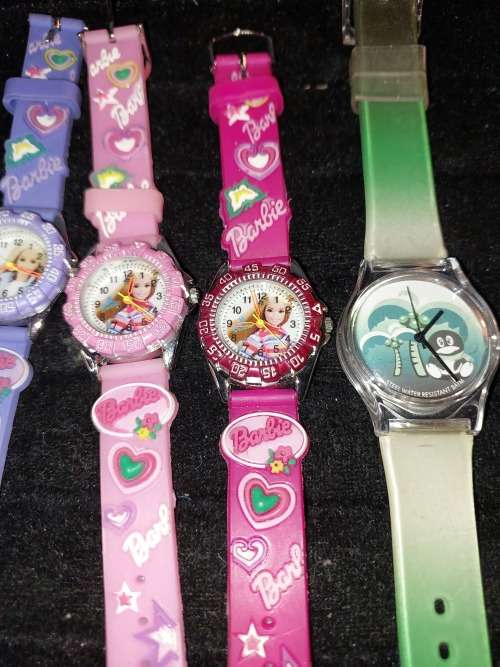 A COLLECTION OF BARBIE DOLL WATCHES