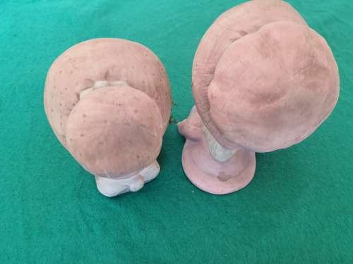 A VINTAGE SET CRAFTED CLAY/PORCELAIN  BABY FIGURINES
