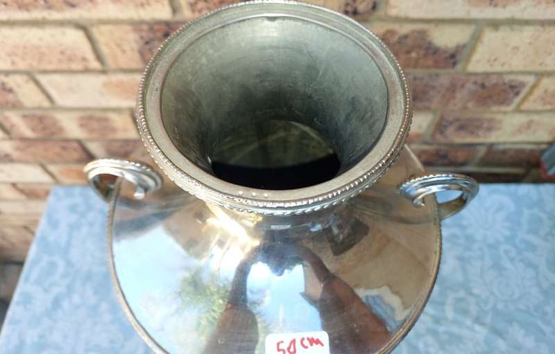 A VINTAGE SILVERPLATED 50-CENTIMETER HIGH ROMAN-STYLE VASE