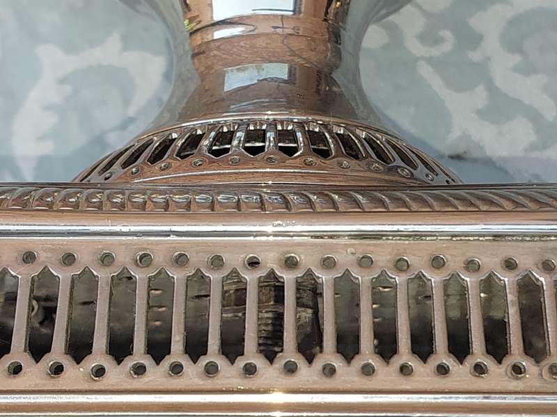 A VINTAGE SILVERPLATED 50-CENTIMETER HIGH ROMAN-STYLE VASE