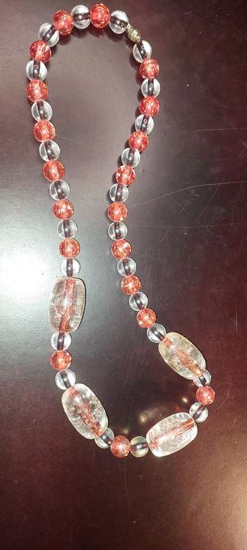 A COLLECTION OF COSTUME NECKLACES SOLD AS IS