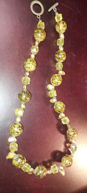 A COLLECTION OF COSTUME NECKLACES SOLD AS IS