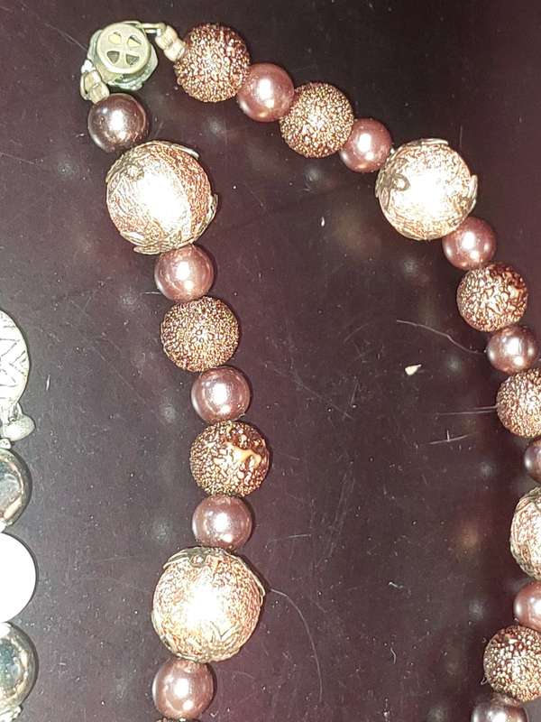 A COLLECTION OF COSTUME NECKLACES SOLD AS IS