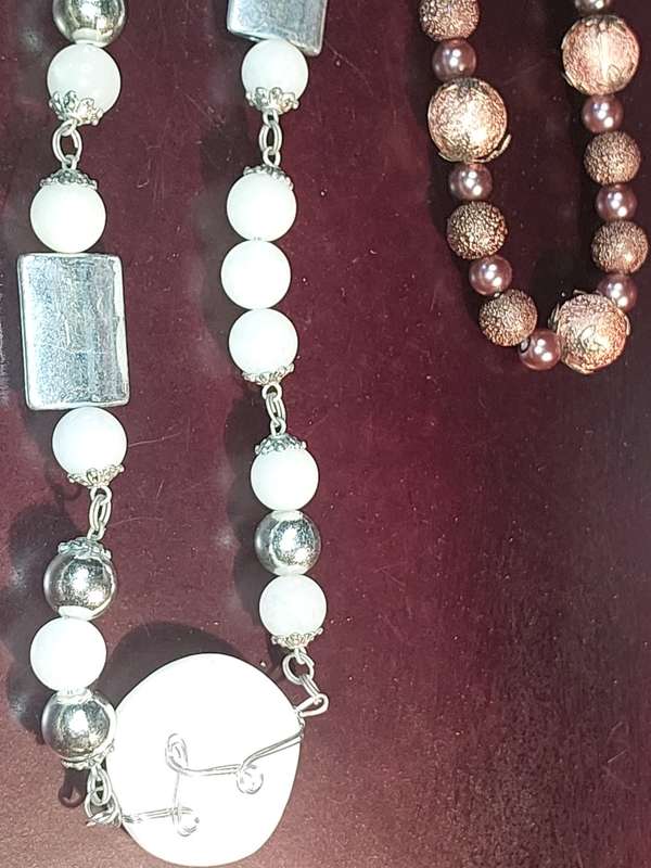 A COLLECTION OF COSTUME NECKLACES SOLD AS IS