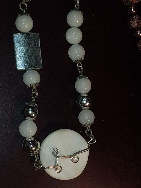 A COLLECTION OF COSTUME NECKLACES SOLD AS IS
