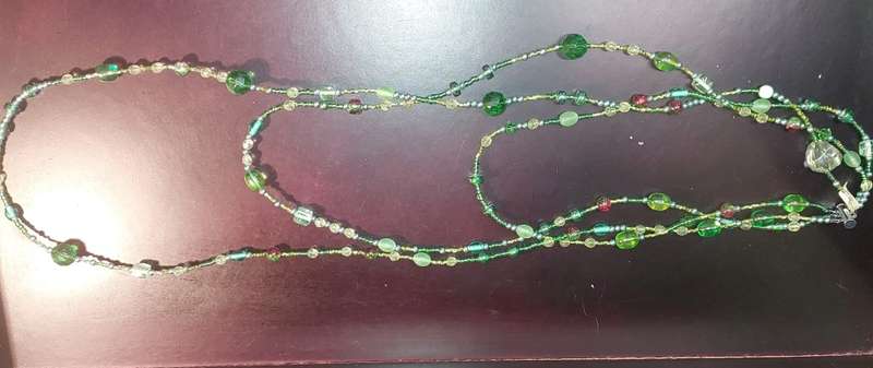 A COLLECTION OF COSTUME NECKLACES SOLD AS IS