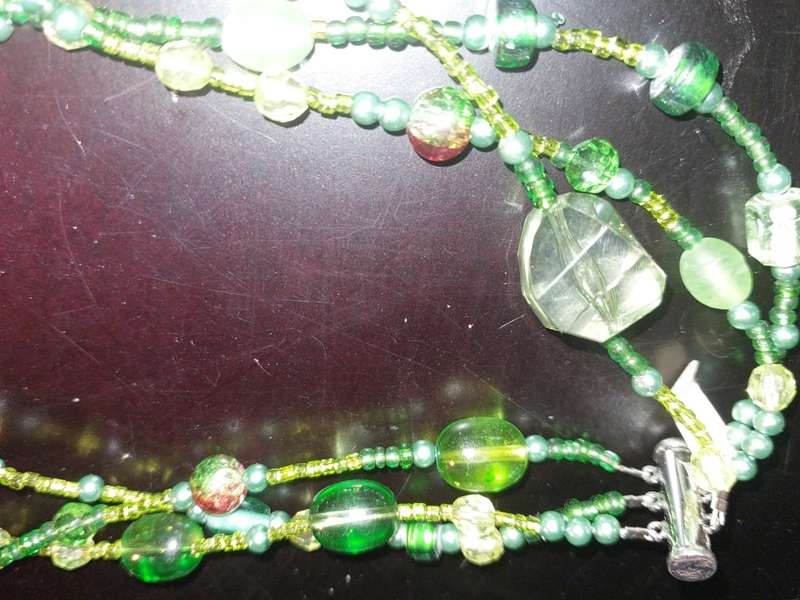 A COLLECTION OF COSTUME NECKLACES SOLD AS IS