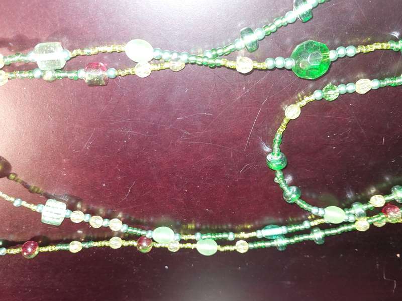 A COLLECTION OF COSTUME NECKLACES SOLD AS IS