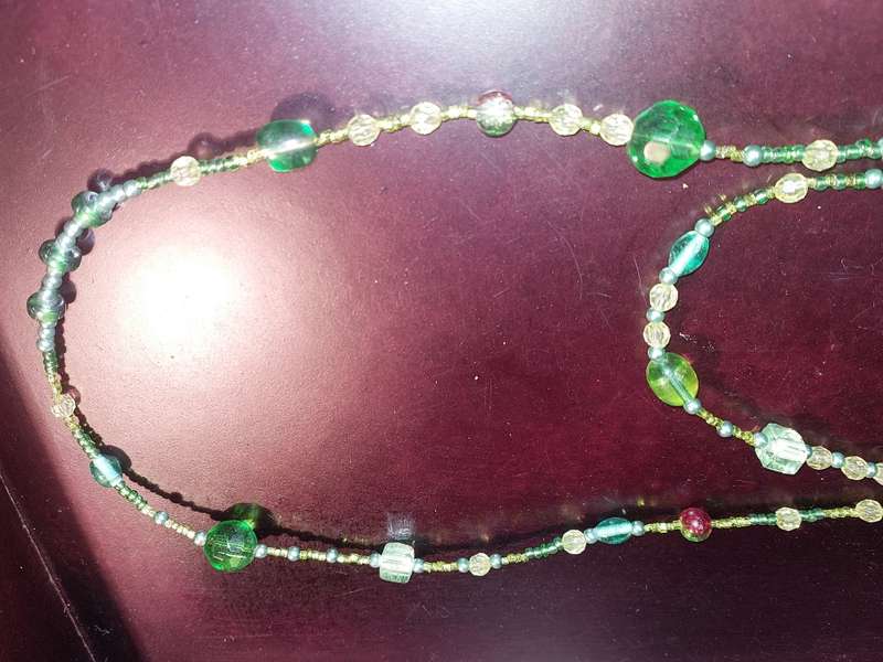 A COLLECTION OF COSTUME NECKLACES SOLD AS IS