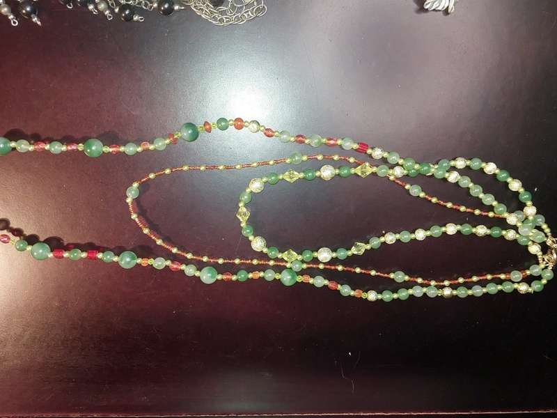 A COLLECTION OF COSTUME NECKLACES SOLD AS IS