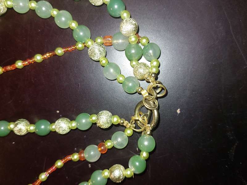 A COLLECTION OF COSTUME NECKLACES SOLD AS IS