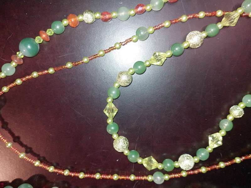 A COLLECTION OF COSTUME NECKLACES SOLD AS IS