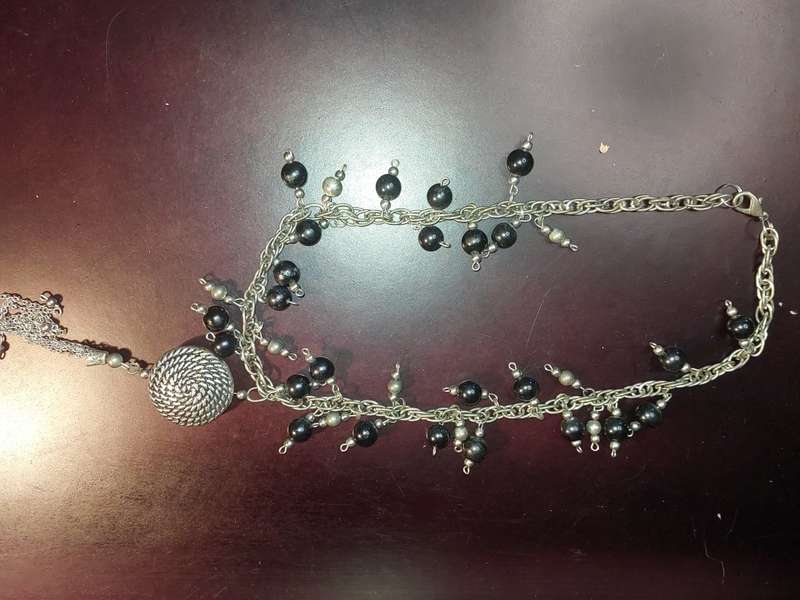 A COLLECTION OF COSTUME NECKLACES SOLD AS IS