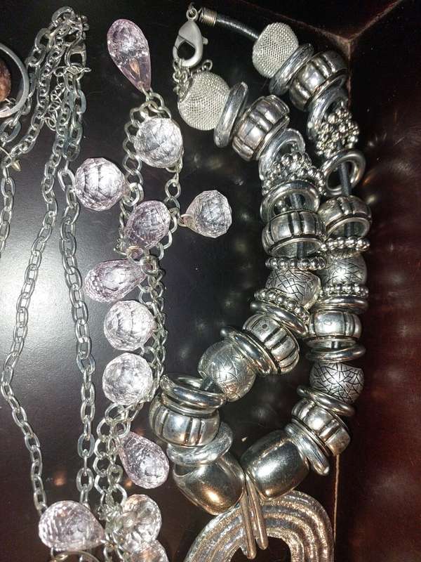 A COLLECTION OF FASHION  COSTUME NECKLACES SOLD AS IS