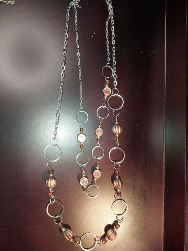 A COLLECTION OF FASHION  COSTUME NECKLACES SOLD AS IS