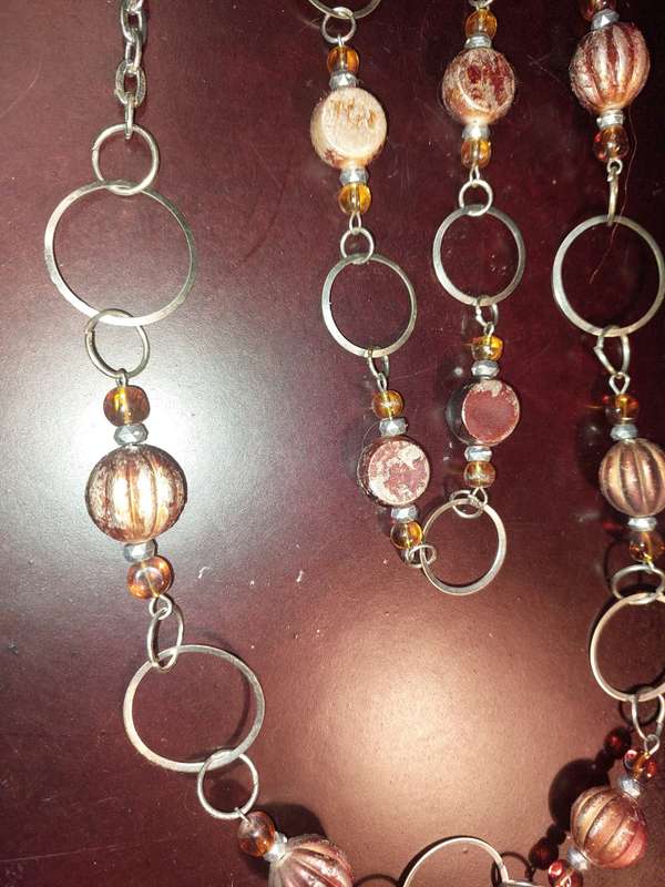 A COLLECTION OF FASHION  COSTUME NECKLACES SOLD AS IS