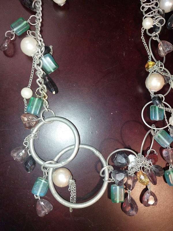 A COLLECTION OF FASHION  COSTUME NECKLACES SOLD AS IS