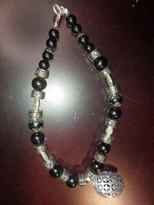 A COLLECTION OF FASHION  COSTUME NECKLACES SOLD AS IS
