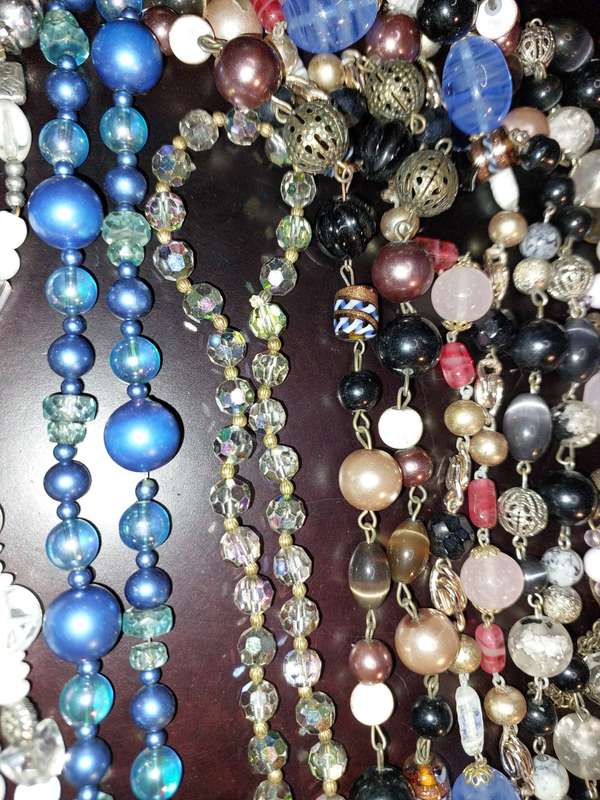 A VINTAGE JOB LOT COSTUME NECKLACES