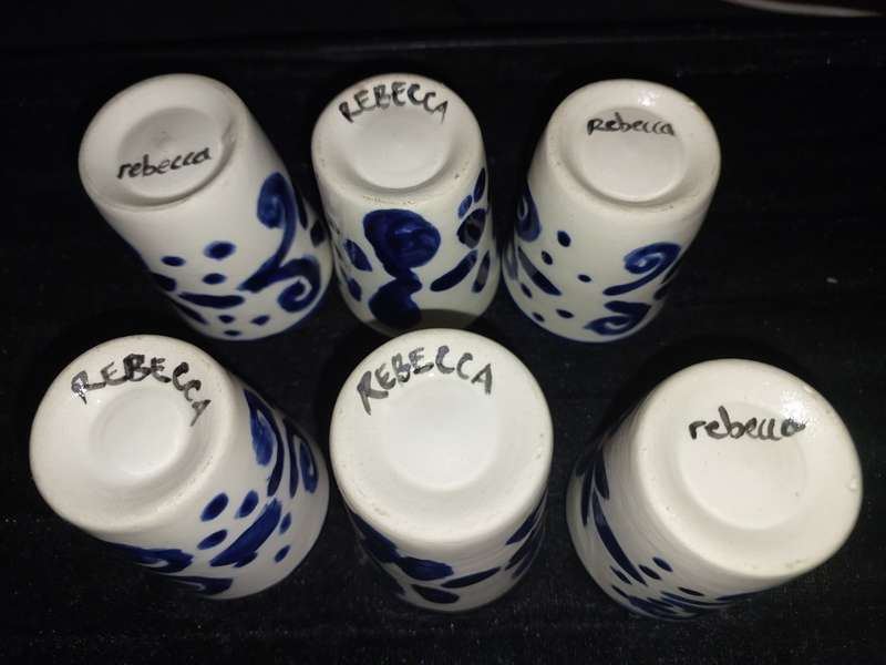 A SET OF SIX DUTCH PORCELAIN CERAMIC SHOT CUPS SOLD AS IS
