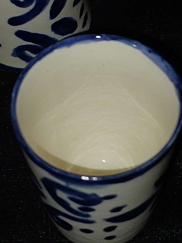 A SET OF SIX DUTCH PORCELAIN CERAMIC SHOT CUPS SOLD AS IS