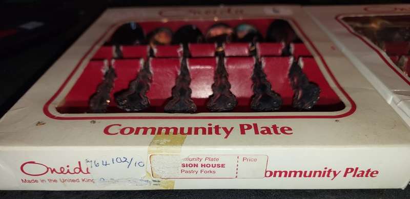 TWO VINTAGE SETS OF COMMUNITY PLATED TEASPOONS IN THEIR ORIGINAL BOXES