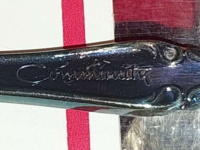 TWO VINTAGE SETS OF COMMUNITY PLATED TEASPOONS IN THEIR ORIGINAL BOXES