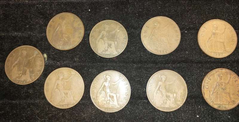 AN ANTIQUE COIN COLLECTION OF 9 ONE PENNY COINS UK