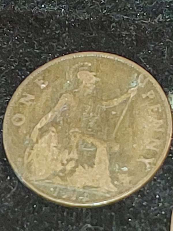 AN ANTIQUE COIN COLLECTION OF 9 ONE PENNY COINS UK