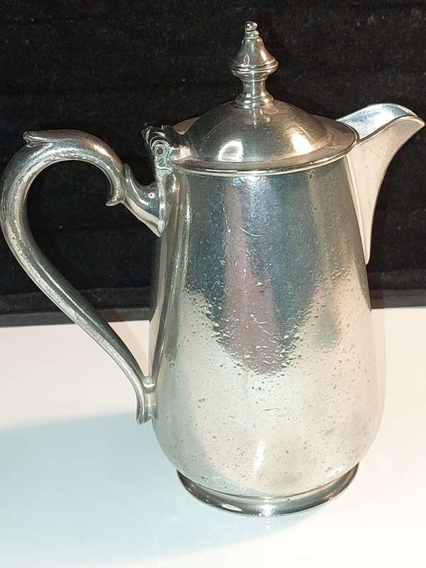 A VICTORIAN SET OF THREE ELKINGTON PLATE CLEGHORNS TEA POTS AND MILK JUG