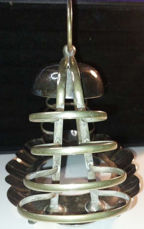 A VINTAGE BREAKFAST TOAST  SERVING STAND SILVER PLATED  SOLD AS IS