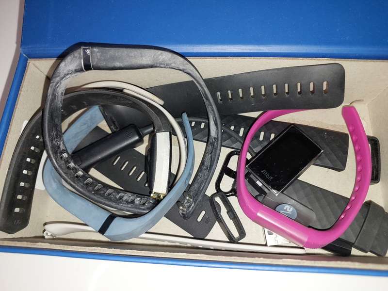 A JOB LOT FITBITS AND ELECTRONIC ITEMS AND CAMERAS