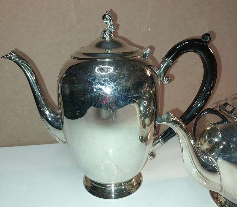 A VINTAGE WM, A. RODGERS SP ON COPPER 1078 MADE IN CANADA TEAPOT SET