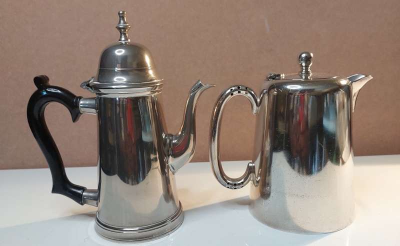 TWO VINTAGE SILVER PLATED TEAPOTS SOLD AS IS