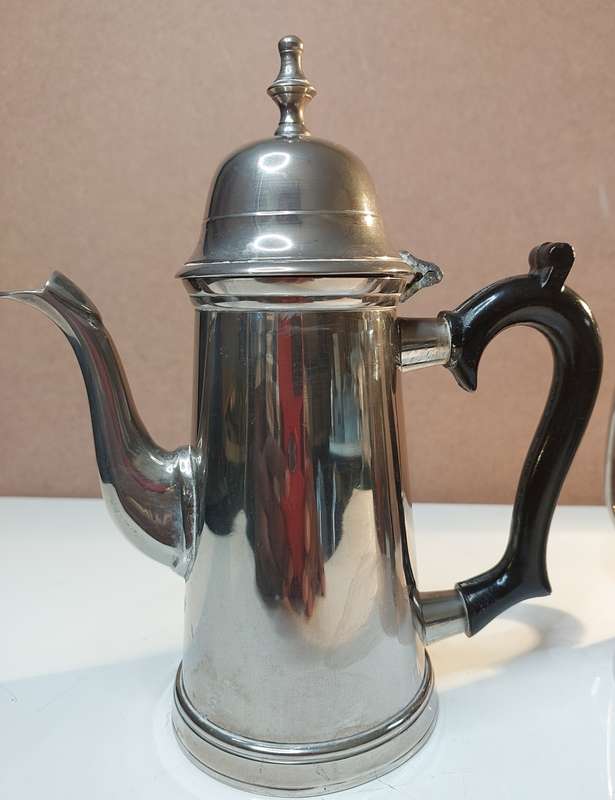 TWO VINTAGE SILVER PLATED TEAPOTS SOLD AS IS