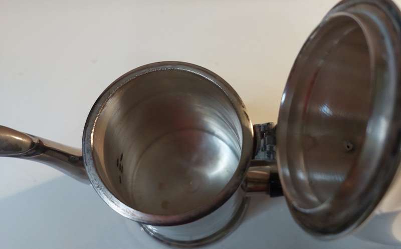TWO VINTAGE SILVER PLATED TEAPOTS SOLD AS IS