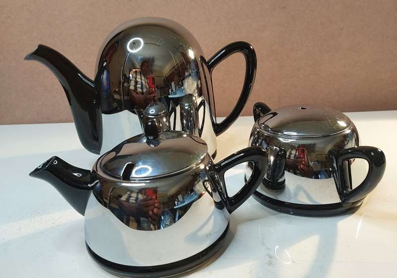 A VINTAGE BLACK PORCELAIN CERAMIC WITH STAINLESS STEEL COVERS TEA POT SET