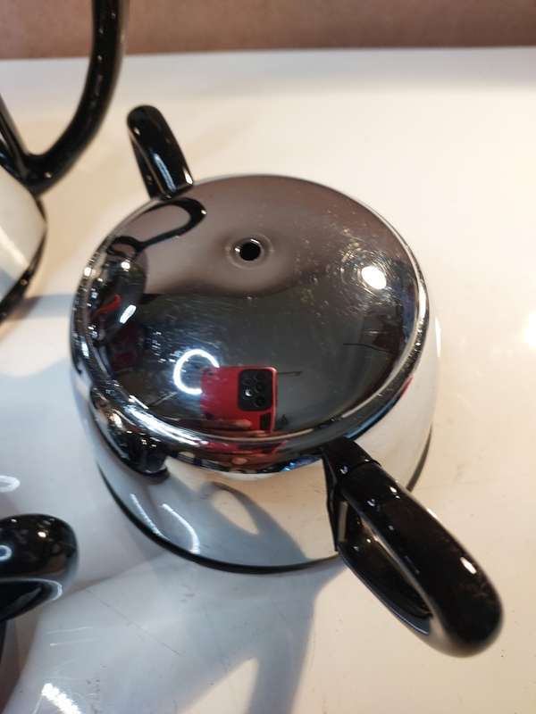 A VINTAGE BLACK PORCELAIN CERAMIC WITH STAINLESS STEEL COVERS TEA POT SET