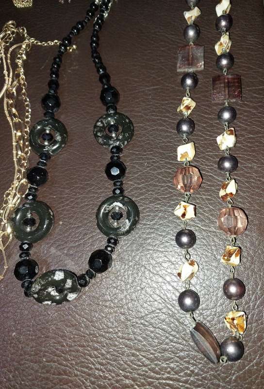 A  VINTAGE COLLECTION OF GOLD PLATED AND SILVER PLATED NECKLACES