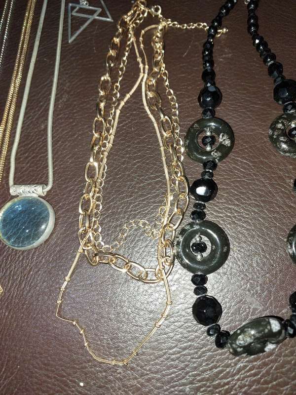 A  VINTAGE COLLECTION OF GOLD PLATED AND SILVER PLATED NECKLACES