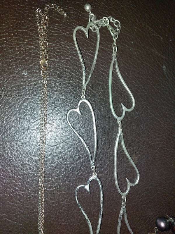 A  VINTAGE COLLECTION OF GOLD PLATED AND SILVER PLATED NECKLACES