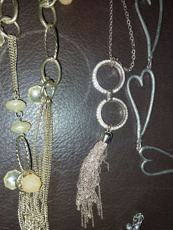 A  VINTAGE COLLECTION OF GOLD PLATED AND SILVER PLATED NECKLACES